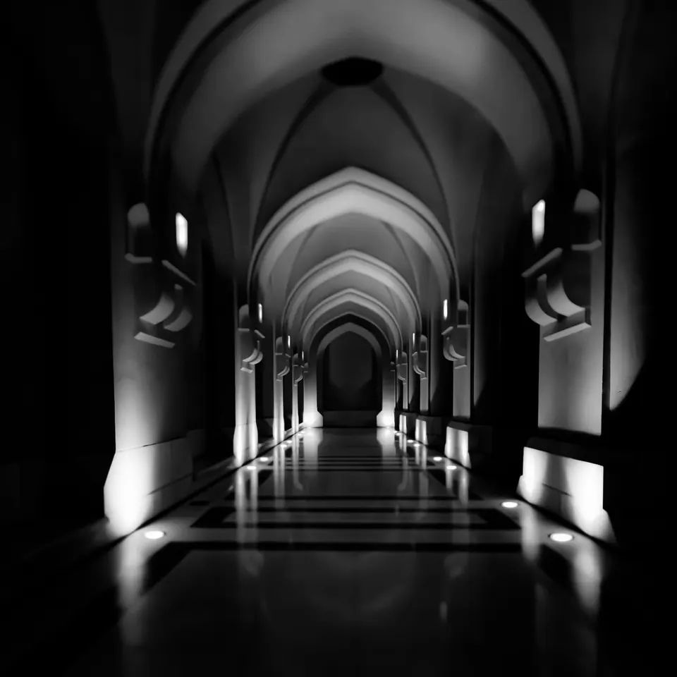Repeating pointed arches and pools of light recede along a monochrome corridor.